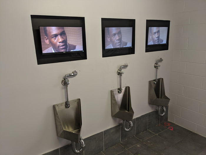 TV's in the mens toilet was such a good idea, until it wasn't.